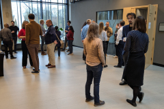 Meeting participants chatting during a coffee break